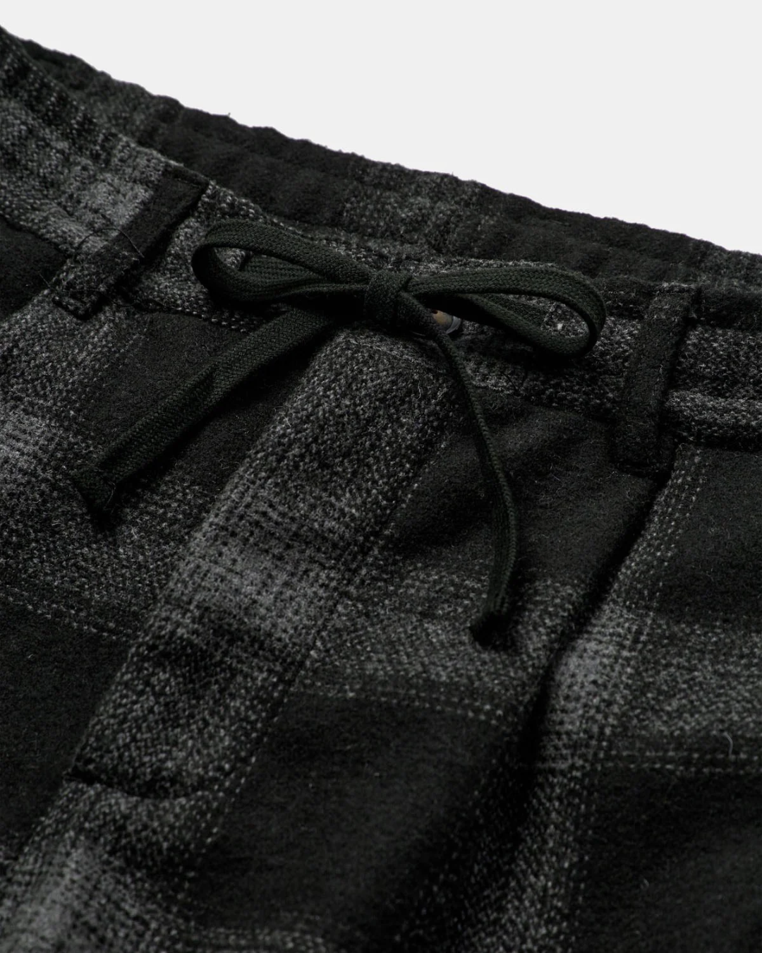 Akjan pleat check wool pants
